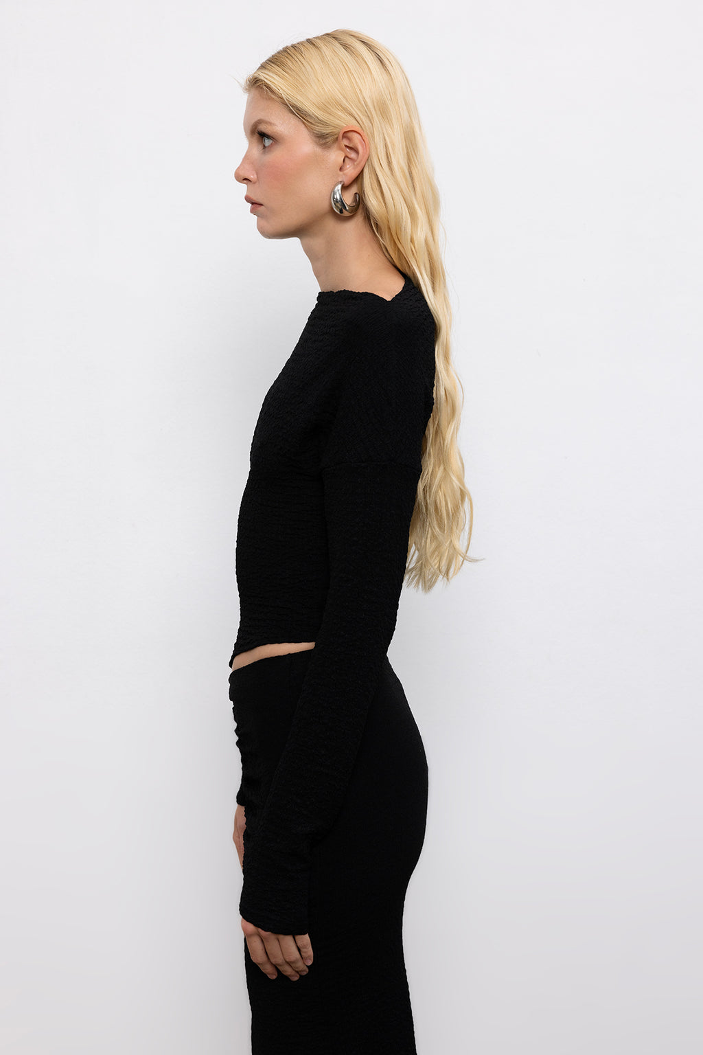 Textured Top with Asymmetrical Hem Detail