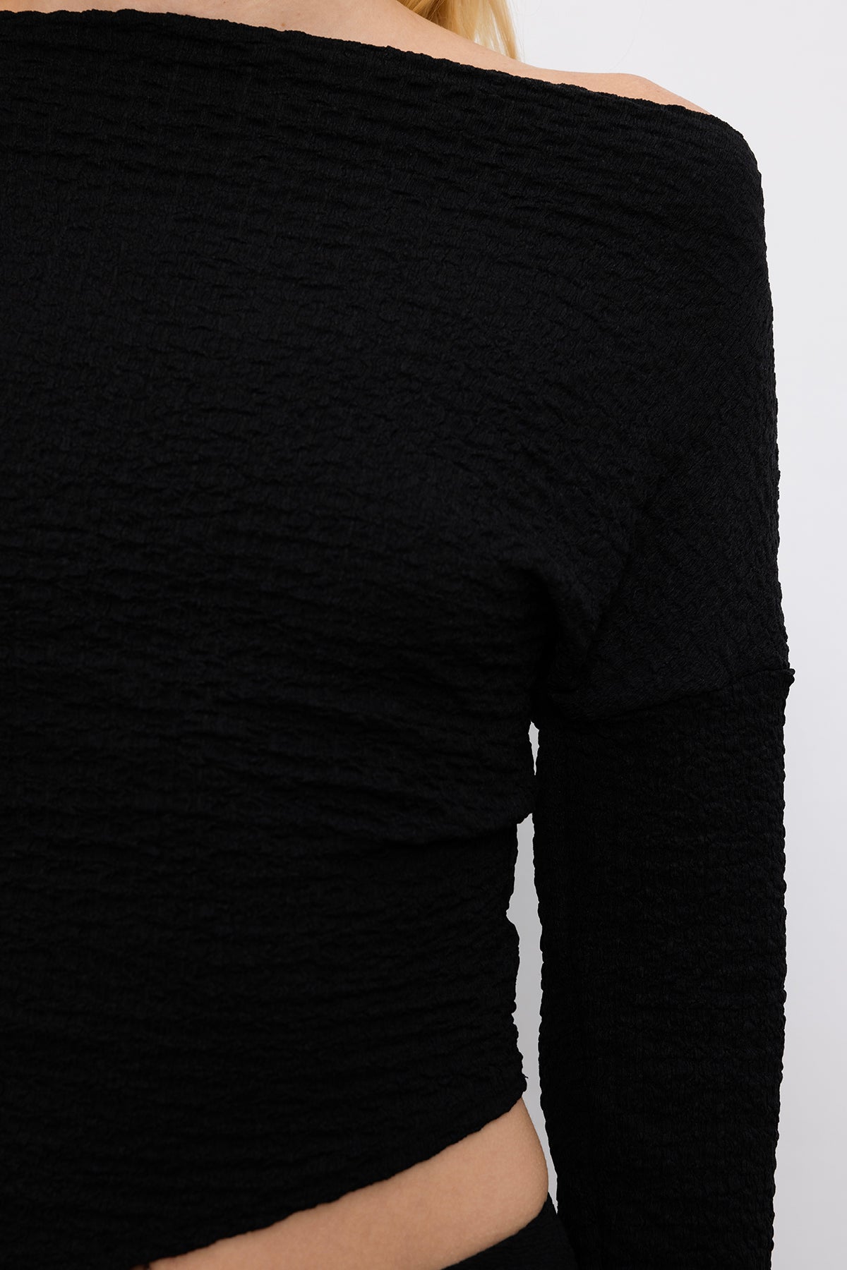 Textured Top with Asymmetrical Hem Detail
