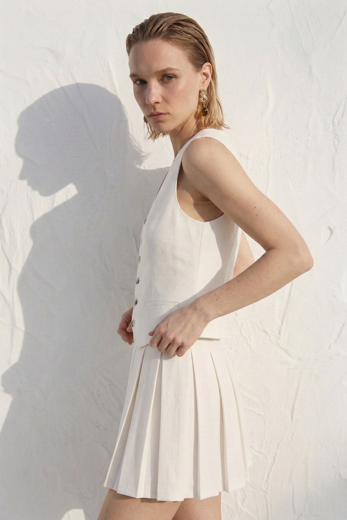 Pleated Sleeveless Mini Dress