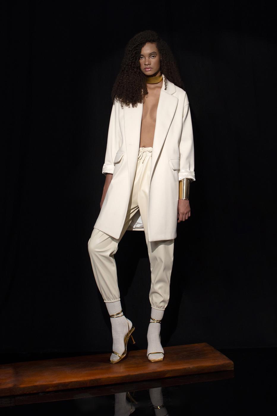 Faux leather jogging pants with belt Ecru