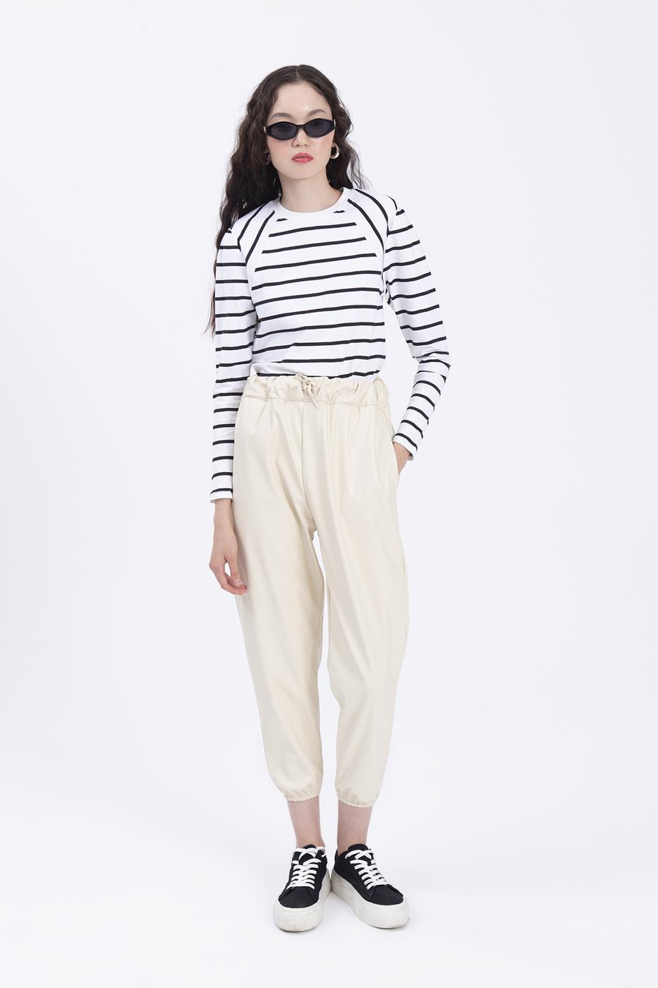 Faux leather jogging pants with belt Ecru