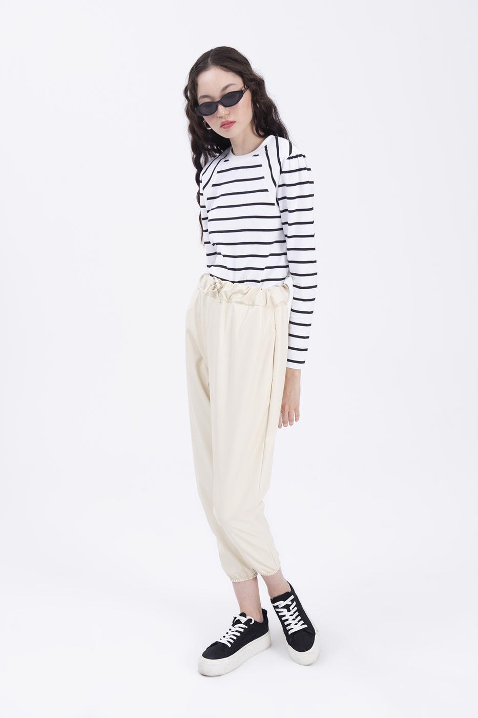 Faux leather jogging pants with belt Ecru